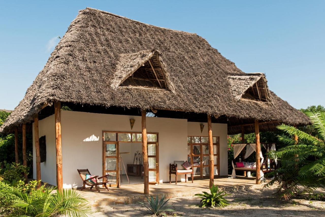 Tikitam Palms Boutique Hotel Понгве Стая снимка
