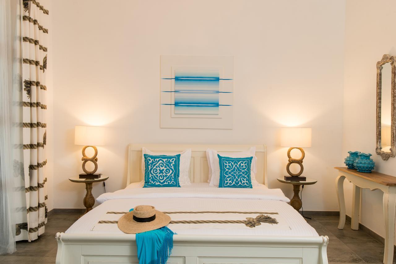 Tikitam Palms Boutique Hotel Понгве Екстериор снимка